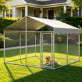Galvanized chain link outdoor dog kennel with lockable door and fabric roof cover on grass – view 2