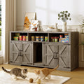 Grey wooden litter box enclosure for two cats used as TV stand