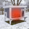 Wooden insulated outdoor cat house with eave and escape door – view 2
