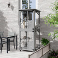 Grey outdoor catio enclosure on wheels with roof and resting box
