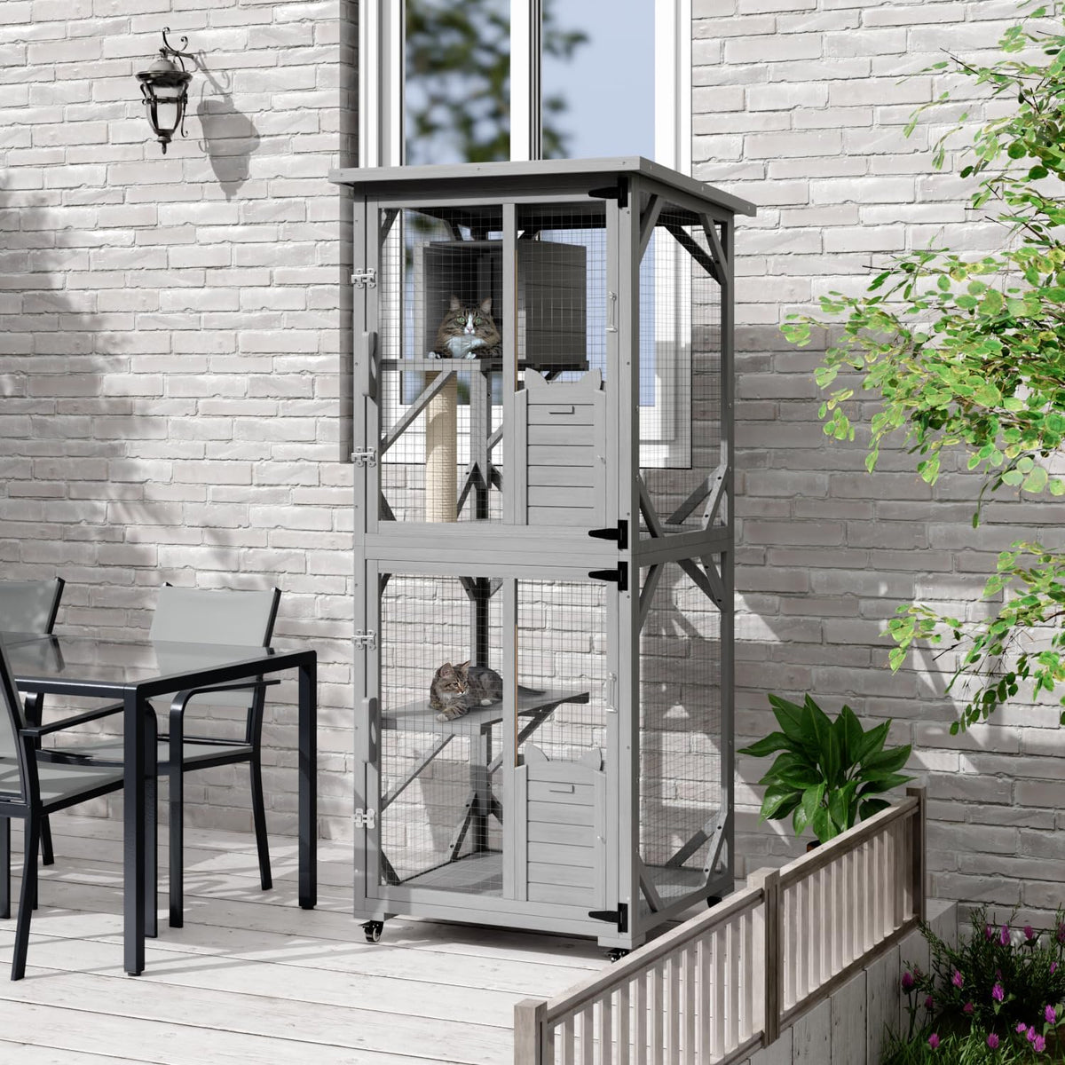 Grey outdoor catio enclosure on wheels with roof and resting box