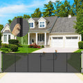 Black retractable mesh gate stretched across a wide deck opening
