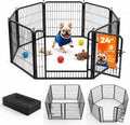 Black 16-panel metal dog playpen with door set up on a lawn – view 2