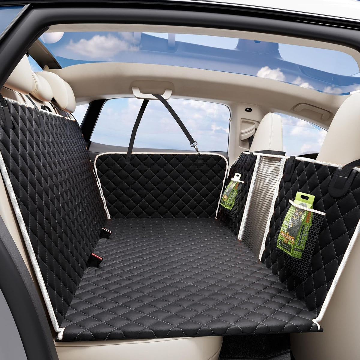 Back seat extender dog car seat cover with hard bottom installed in a car