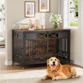 Brown wooden XXL dog crate furniture on wheels used as a TV stand