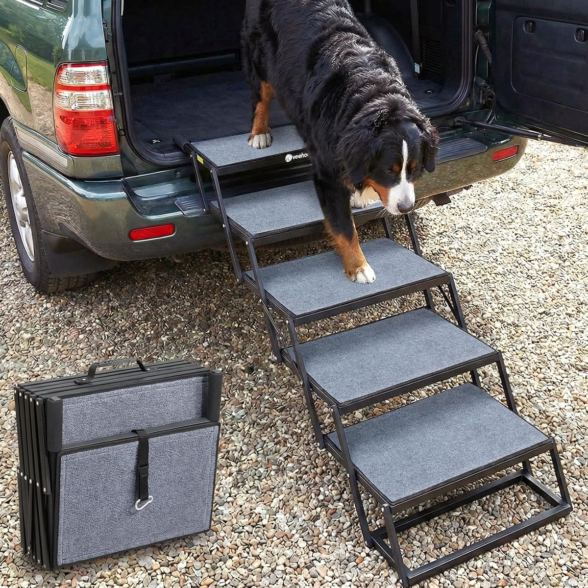 Extra wide folding 5-step dog stairs leaning against an SUV