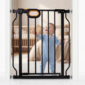 Black extra wide walk-through metal dog gate with door across a large opening – view 18