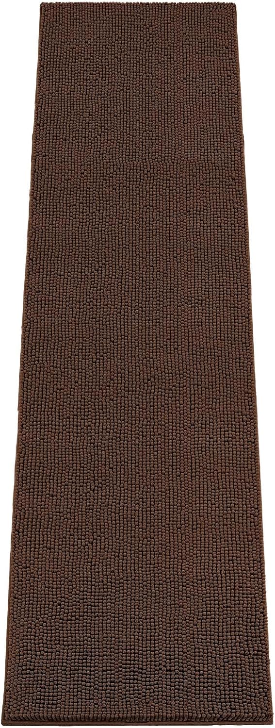 Brown chenille dog door mat runner at an entryway