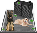 Extra large white dog pee pad unfolded on a floor
