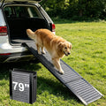 Black 79 inch foldable dog ramp leaning against an SUV