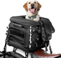 Black pet carrier crate mounted on a motorcycle luggage rack