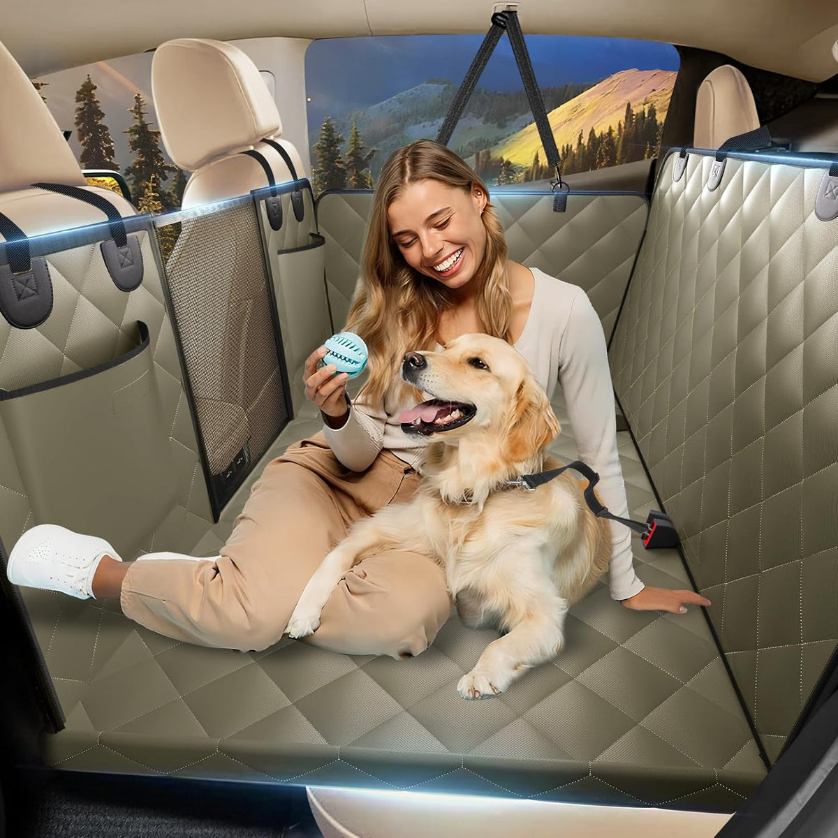 Beige hard bottom dog hammock back seat extender with mesh window in an SUV
