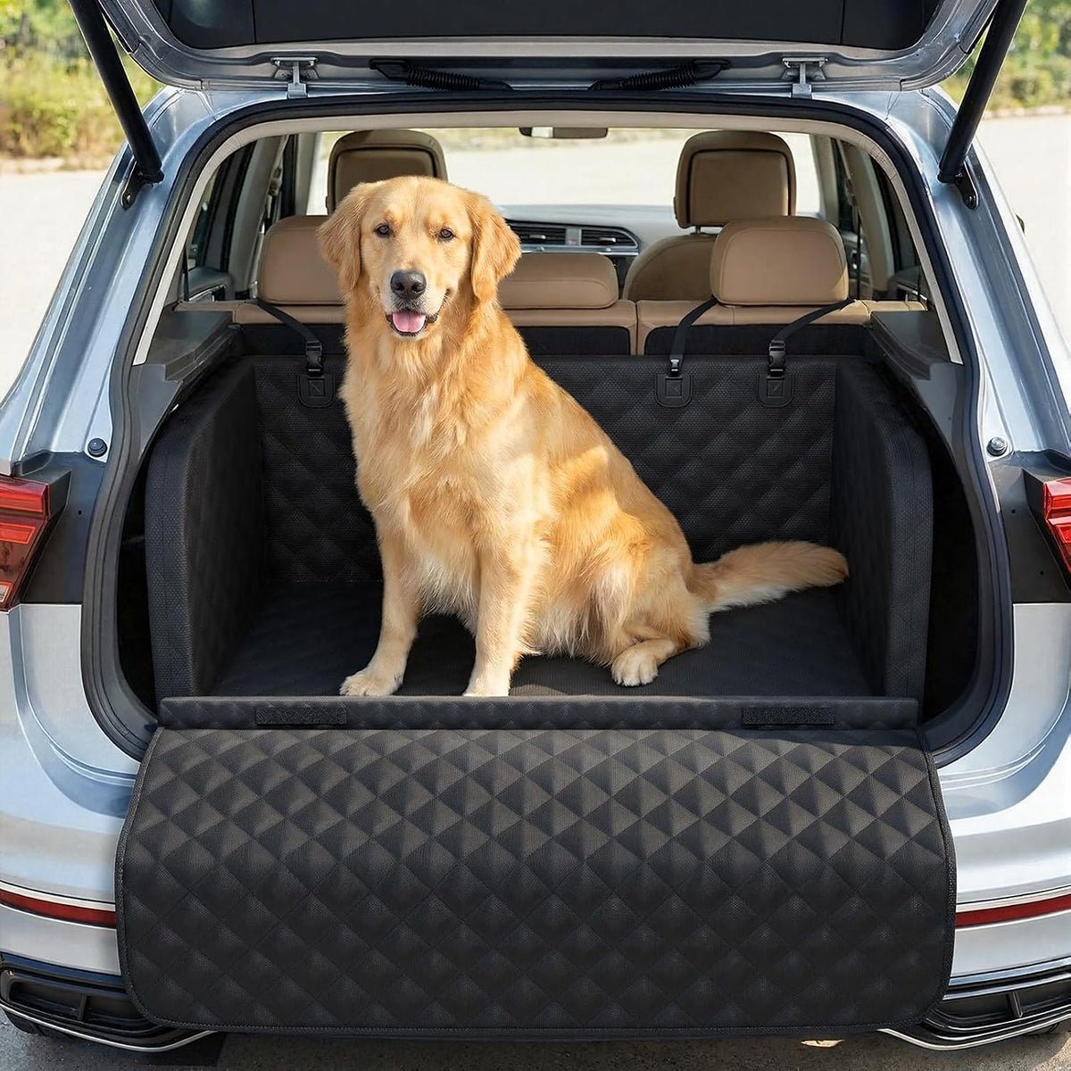 Black padded dog cargo liner with bumper flap in an SUV trunk – view 2