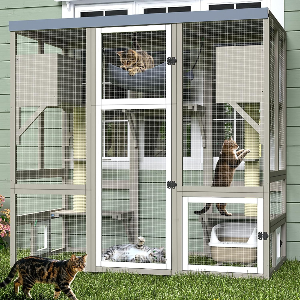 Walk-in wooden outdoor catio with platforms, hammock and roof cover