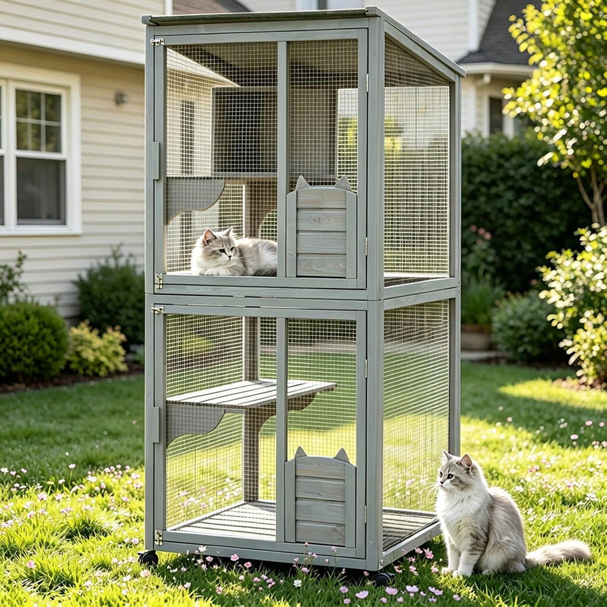 Wooden multi-level catio enclosure on wheels with waterproof cover and lockable doors