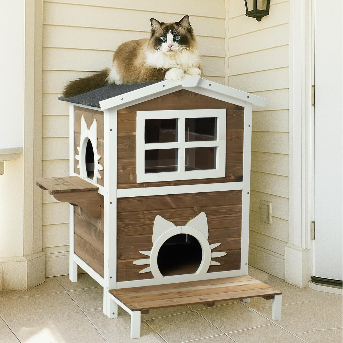 Gray two-level spruce wood outdoor cat house