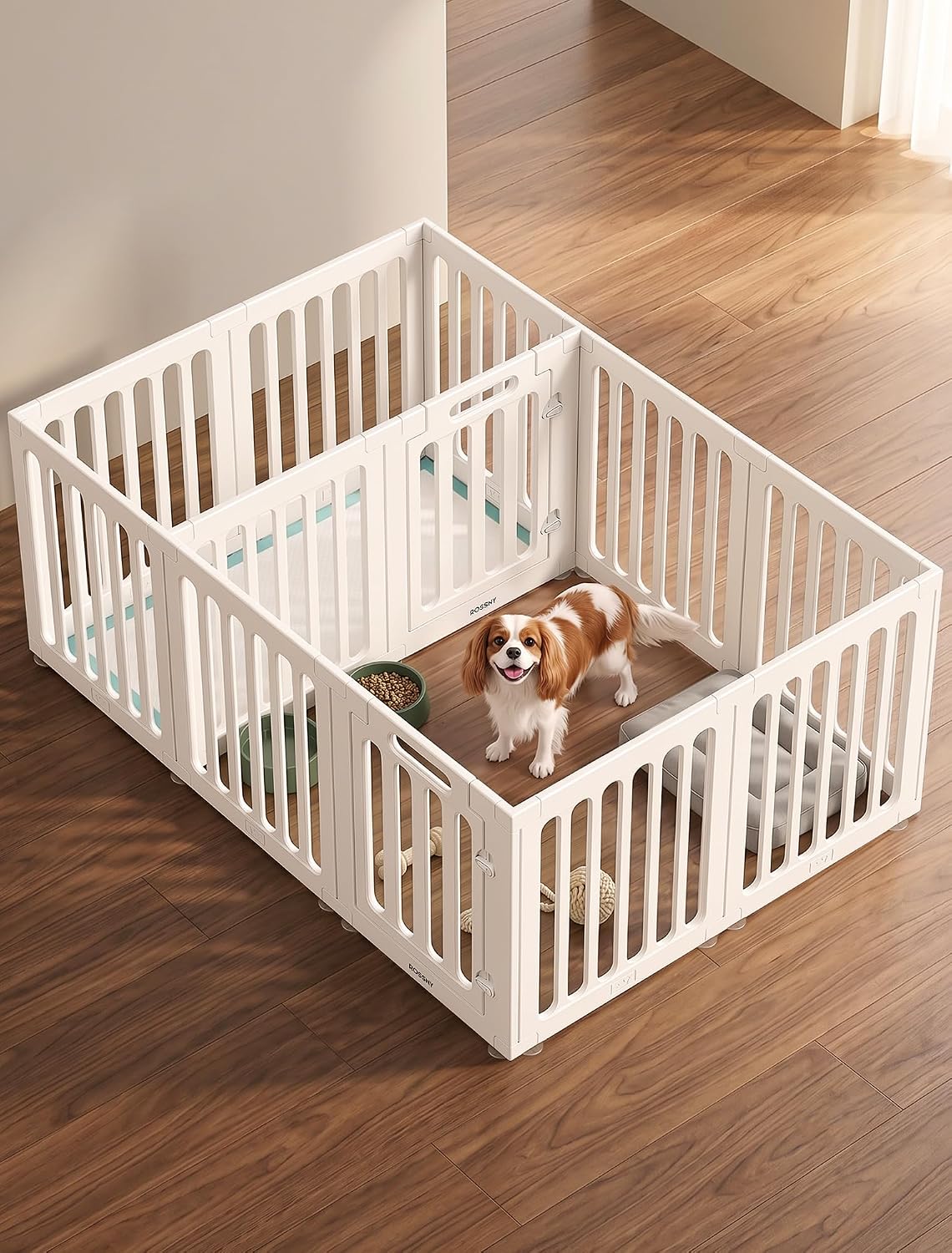 White 12-panel plastic puppy playpen with center divider and two doors