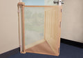 White retractable pet barrier mounted inside an exterior door – view 2