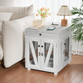 Gray wooden dog crate end table with USB charging station and drawer