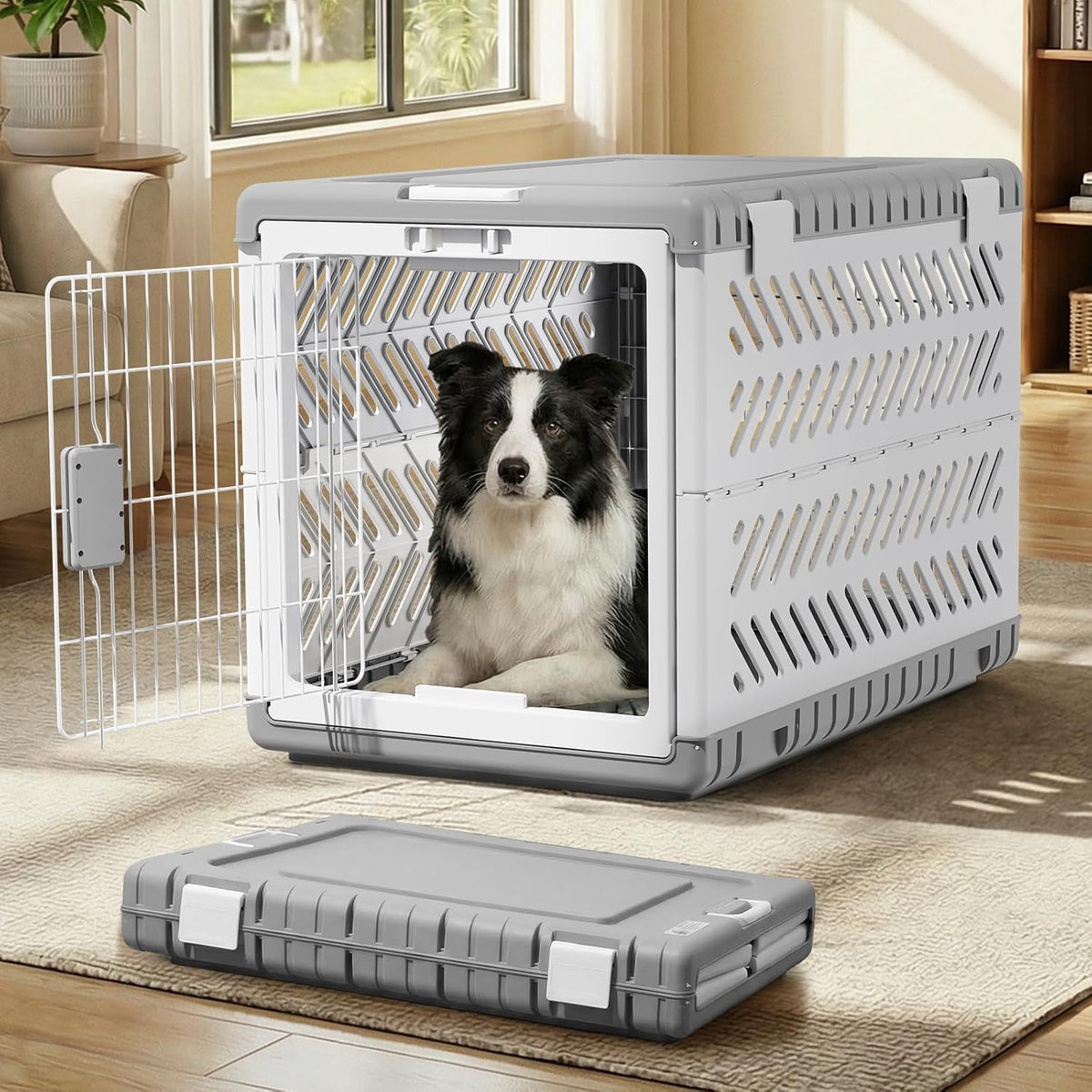 Gray collapsible fabric travel dog crate with two wheels