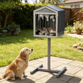 Elevated wooden outdoor cat feeding station with sloped roof
