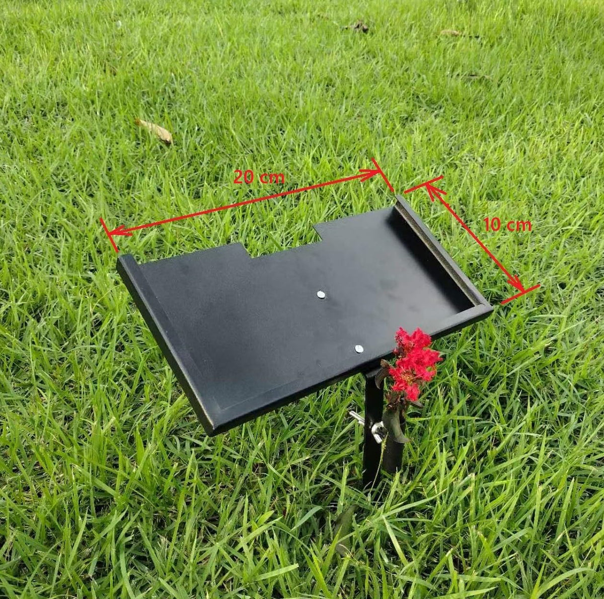 Pet memorial plaque stand holding a 24 x 12 in grave marker in a garden – view 2