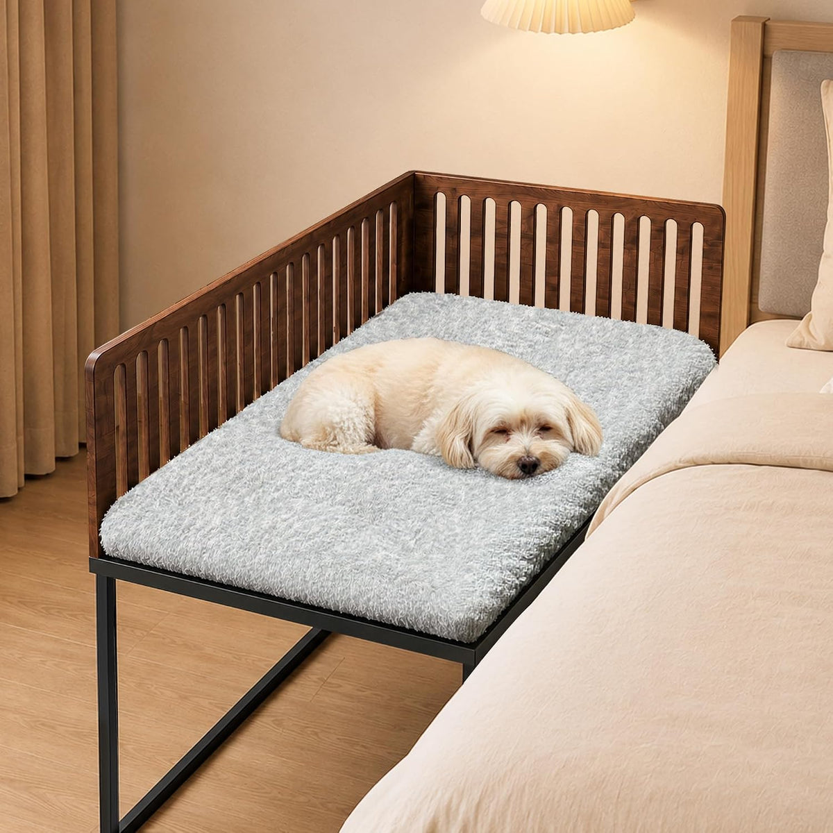 Metal frame bedside dog bed with removable cushion next to a mattress
