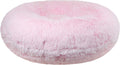 Round extra plush faux fur dog bed