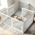 White plastic puppy playpen with 18 clear panels set up indoors