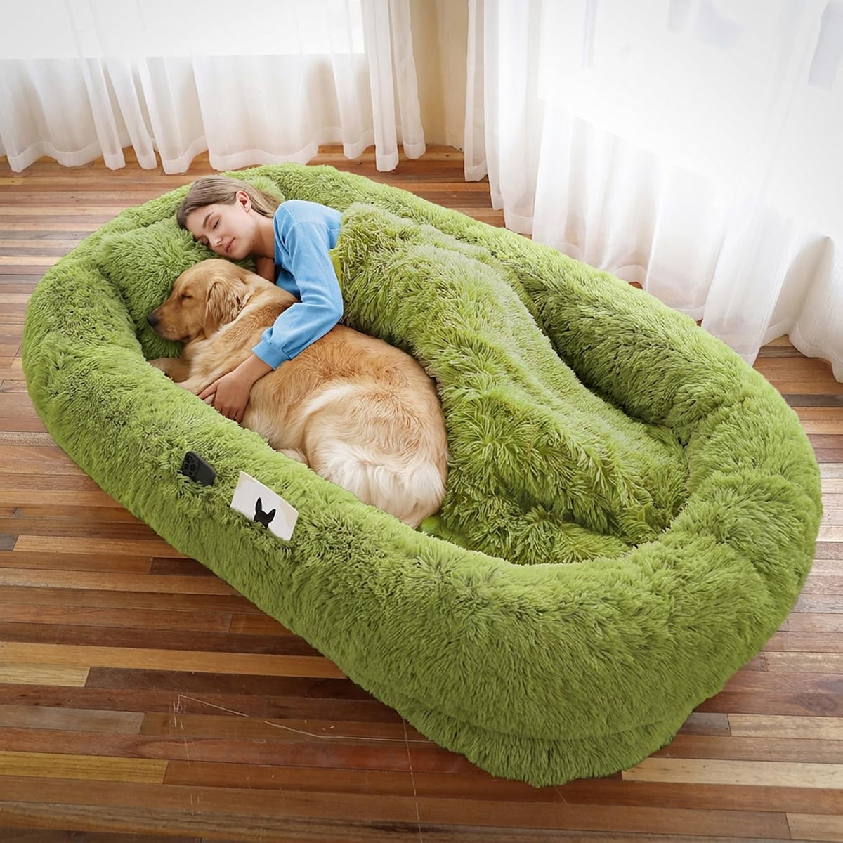 Grass green human-size faux fur nest bed with pillow and blanket