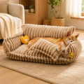 Fluffy dark grey dog couch bed with bolster sides and pillow