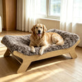 Natural wood elevated dog bed frame with memory foam mattress and removable cover