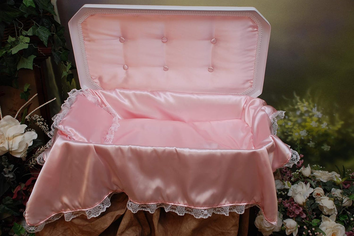 White pet burial casket with domed lid and pink interior, medium size