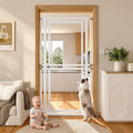White extra tall clear acrylic cat gate in a narrow doorway