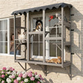 Tall dark gray wooden window catio with galvanized mesh and perches