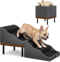Foldable dog stairs ottoman with ramp side placed against a living room couch
