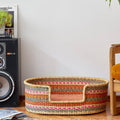 Handwoven elephant grass dog bed basket with star pattern