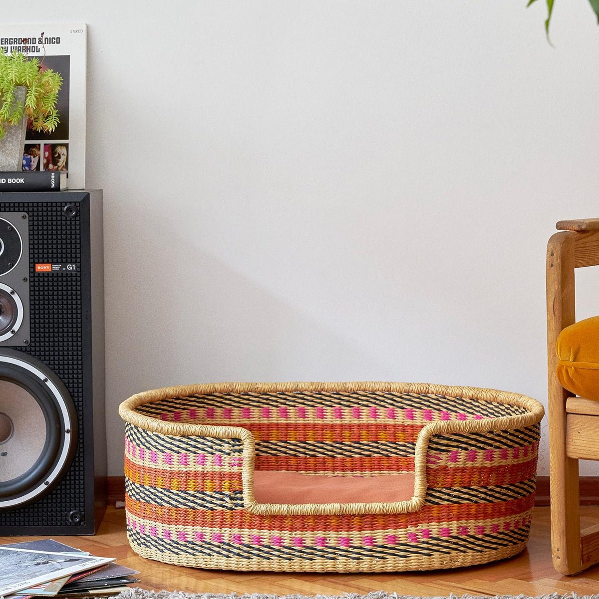 Handwoven elephant grass dog bed basket with star pattern