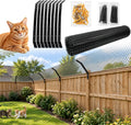 Cat fence topper barrier mounted along a backyard fence