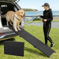 Extra long folding aluminum dog ramp leading into an SUV – view 2