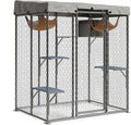 Grey walk-in metal outdoor catio with platforms and hammocks in a backyard