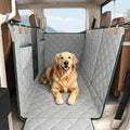 Gray waterproof dog floor cover installed in the back of a crew cab pickup truck