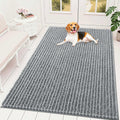 Grey chenille doormat across a wide entryway for muddy dog paws
