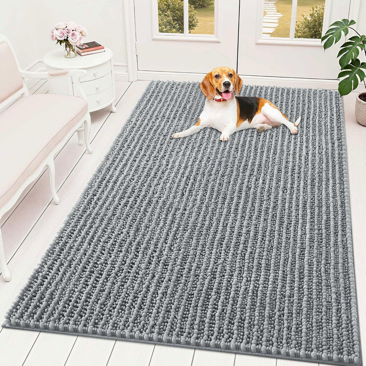 Grey chenille doormat across a wide entryway for muddy dog paws