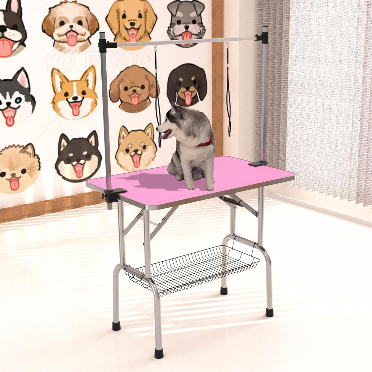 Pink foldable dog grooming table with adjustable arm and mesh tray