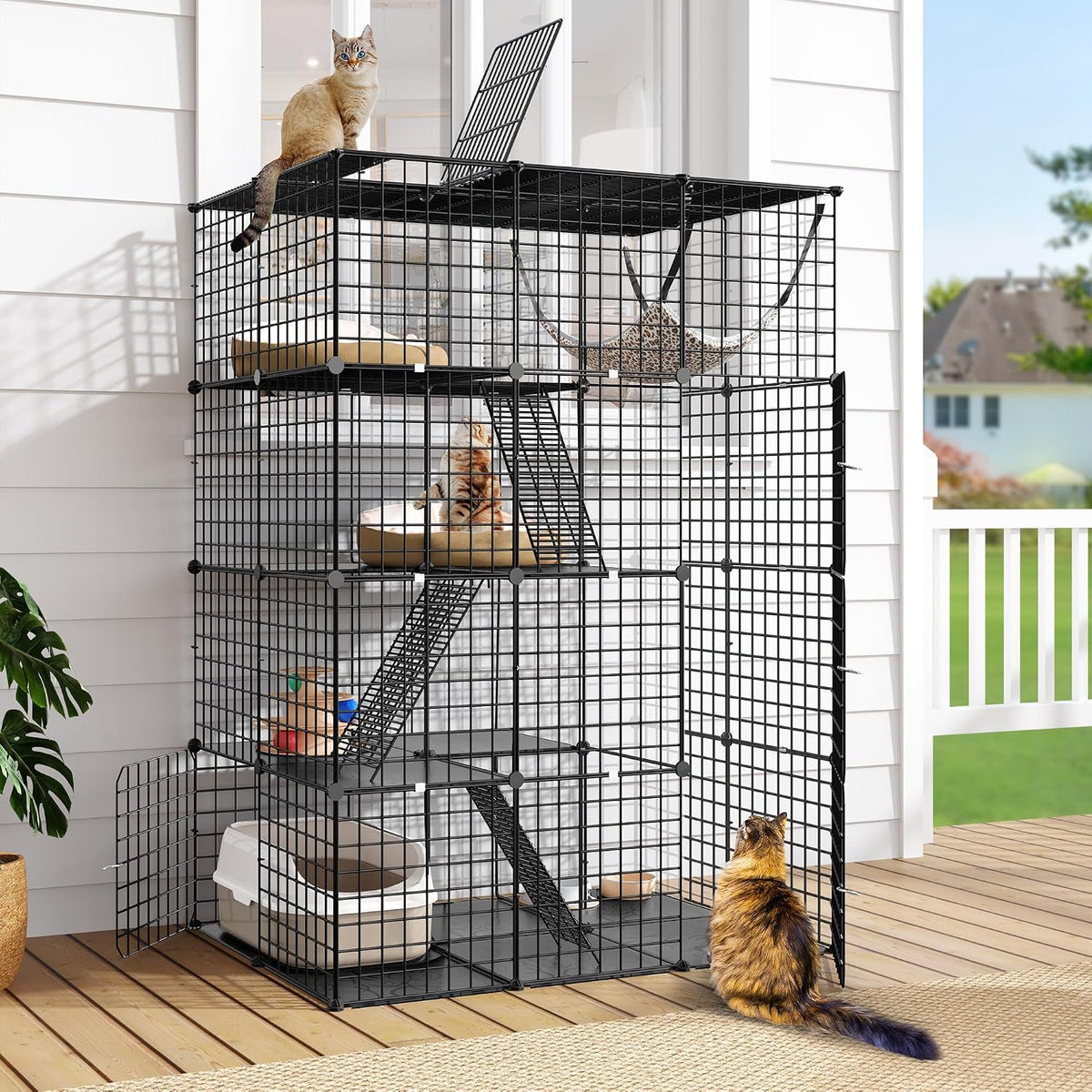 Black four-tier metal cat cage with hammock and stairs
