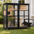 Multi-level wooden outdoor cat enclosure on wheels