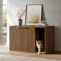Fluted wooden litter box enclosure cabinet with cat entry and scratch pad
