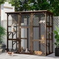 Walk-in wooden outdoor catio with platforms, sleeping room and asphalt roof