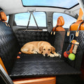 Hard bottom dog back seat bridge installed in a pickup truck rear cab
